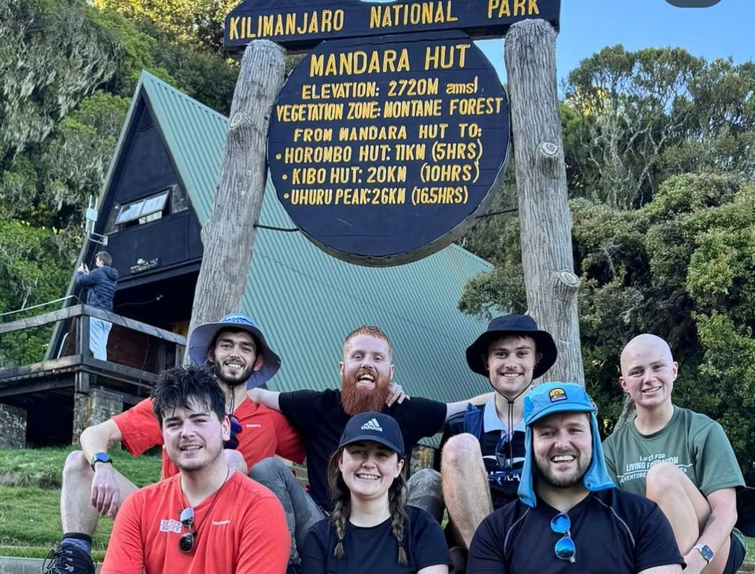 Guests enjoying Kilimanjaro day hike and wildlife encounters at Serval Sanctuary in Tanzania